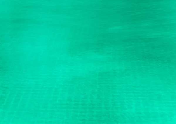 Texture of water in the pool, green color background