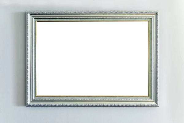 The blank ornate picture frame on the wall — Stock Photo, Image