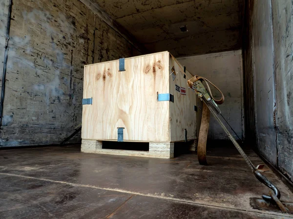 Radiation label beside the transport wooden box