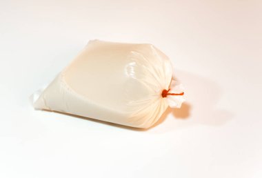 Plastik torbada soya sütü geleneksel Tayland ya da Çin mutfağı.