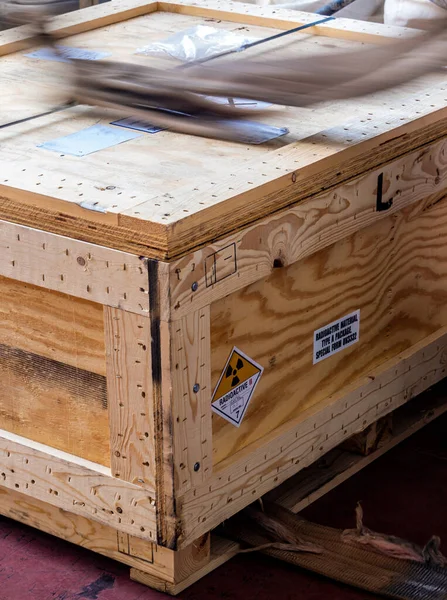 Radioactive material label beside the transportation wooden box Type A standard package