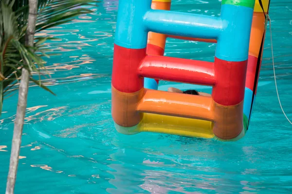 Swimming pool water sports large wheel tubing. Colorful water wh