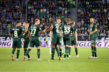 Wolfsburg, Almanya, 11 Ağustos 2018: Vfl Wolfsburg takım zafer bir maç sırasında 2018-2019 sezon Wolfsburg Volkswagen Arena kutluyor. Michele Morrone tarafindan fotograf.