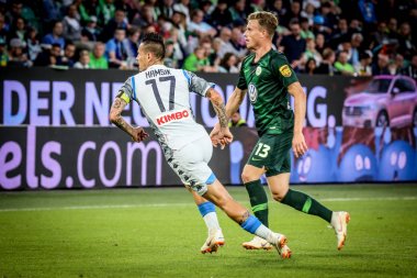 Wolfsburg, Germany, August 11, 2018: Yannick Gerhardt and Marek Hamsik during a soccer match between Vfl Wolfsburg and SSC Napoli.