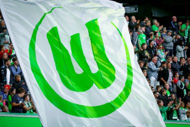 Wolfsburg, Germany, August 11, 2018: flag waving around the VfL Wolfsburg fans during a match at Volkswagen Arena in Wolfsburg. Photo by Michele Morrone.
