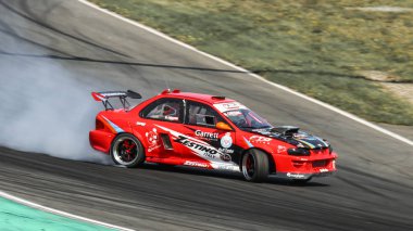 Oschersleben, Almanya, 31 Ağustos 2019: İtalyan yarış pilotu Massimo Checchin, Almanya'daki Motorsport Arena'da düzenlenen Drift Kings Uluslararası Serisi sırasında Subaru Impreza Gc8 kullanıyor.