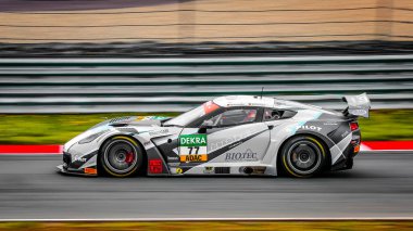 Oschersleben, Almanya, 27 Nisan 2019: Almanya 'daki Motorsport Arena' da yapılan GT MASTER araba yarışı sırasında Corvette C7 GT3-R kullanan Markus Pommer.
