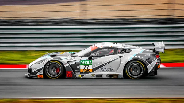Oschersleben, Almanya, 27 Nisan 2019: Almanya 'daki Motorsport Arena' da yapılan GT MASTER araba yarışı sırasında Corvette C7 GT3-R kullanan Markus Pommer.
