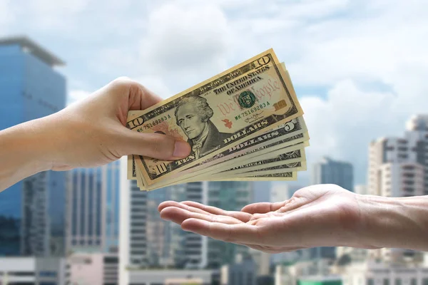 Hand Holding Pay Dollar Cityscape Background — Stock Photo, Image