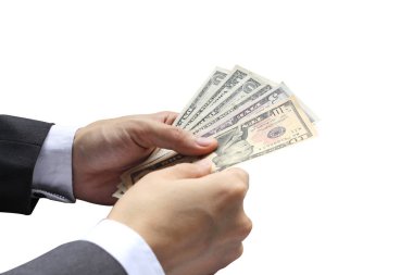 ABD Doları beyaz bir arka plan üzerinde ödeme tutan el.