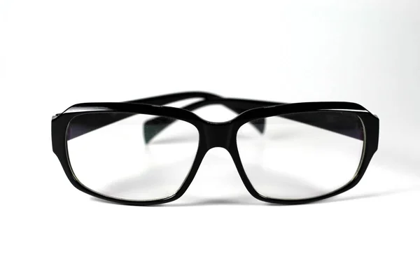 Schwarze Brille isoliert auf weißem Hintergrund, Nahaufnahme schwarz ey — Stockfoto