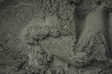 Arka plan için Grunge koyu gri yüzey. Tuğla ve alçı döşeme malzemesi.