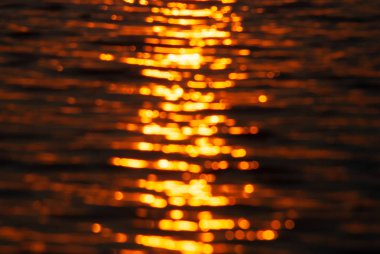 Romantik arka plan, odak nde günbatımı, dalgalar