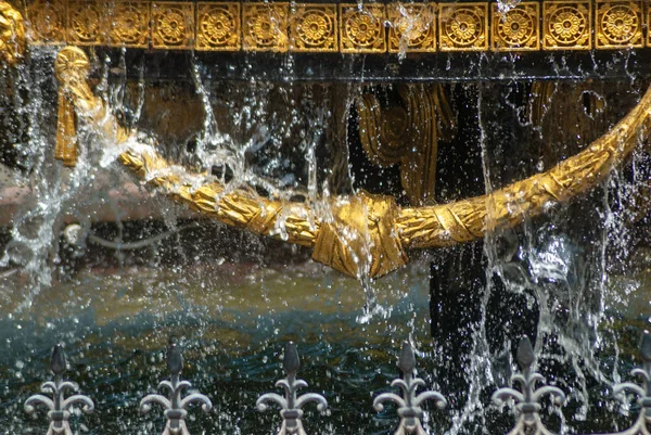 Close-up of the city fountain with gilded decor elements and dripping water, fountain in Tbilisi, — Stock Photo, Image