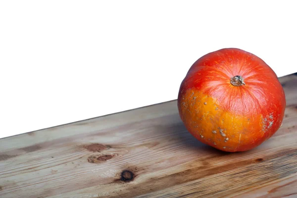 Pumpkin on the table. Fresh orange pumpkin isolated on white background — Stock Photo, Image