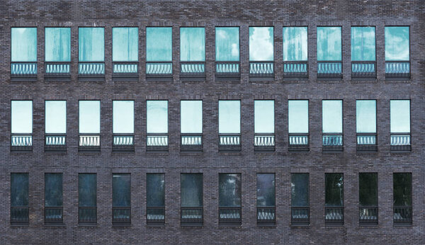 Loft modern brick facade of the building. Architectural elements of the city