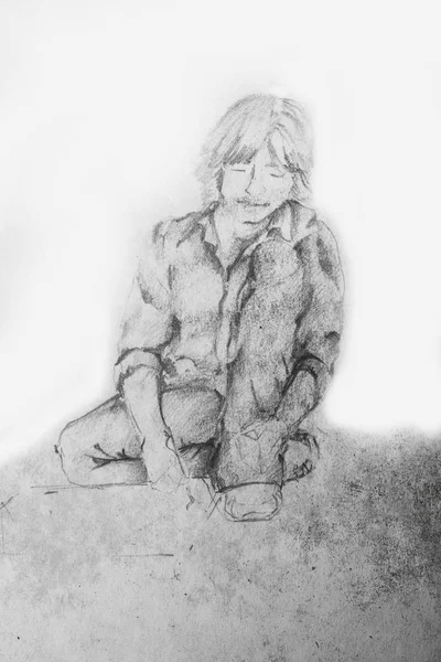 年轻的学生男孩坐在地上看书 铅笔素描 — 图库照片