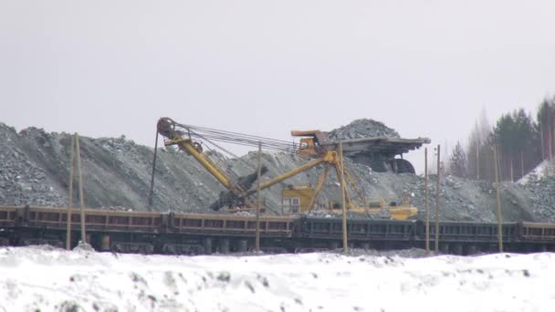 Perspective view of truck excavating minerals. Mining operation. — Stock Video