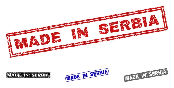 Grunge MADE IN SERBIA Guarnizioni di francobolli rettangolo graffiati — Vettoriale Stock