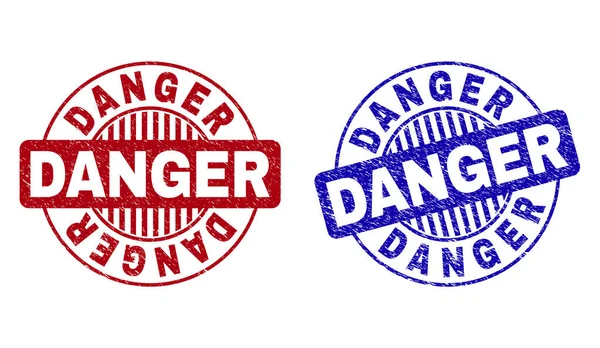 Grunge DANGER Textured Round Watermarks — Stock Vector