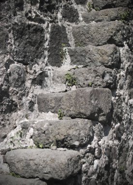 soyut bir savunma kalıntıları eski bir taş duvar. mimari bir eski kale, gri taş parçası.