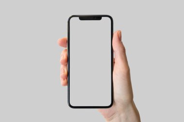 Çerçeve ücretsiz / çerçevesiz modern smartphone tarafsız arka plan önünde tutan el