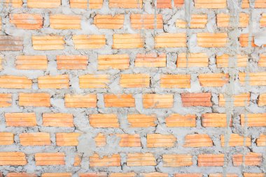 Bir tuğla duvar paneli clutching tuğla ve harç, bağlayıcılar beton orta oluşur.