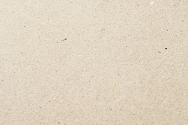 Texture di vecchia carta crema chiara organica, sfondo per il design. Materiale riciclabile, ha piccole inclusioni di cellulosa — Foto Stock