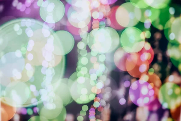 Αφηρημένα φόντο Χριστούγεννα, φωτεινά πολύχρωμα bokeh, λάμψη γιορτινή λάμψη, για το σχέδιο, διαφορετικά θέματα — Φωτογραφία Αρχείου