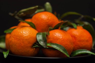 Mandalina. Mandarin. Güneş meyve enerji güneş, sembol mutluluk, zenginlik ve başarı ile. Seçici odak