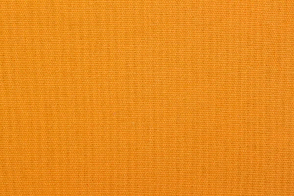 明るいオレンジ色の布のテクスチャ、背景、テキストまたはイメージのコピー スペース デザイン. — ストック写真