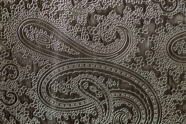 Texture de cuir véritable gris gros plan, avec motif tendance floral en relief, papier peint ou bannière design. Avec place pour votre texte — Photo