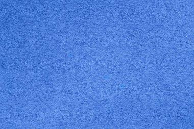 Yumuşak kağıt tanecikli pürüzsüz, parlak mavi doku. Zarif tasarım için sakin ve minimal. Renk uyumu kavramı, temiz doku, ince incelik.
