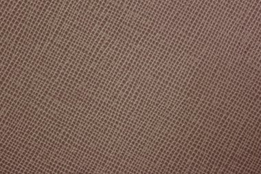 Yumuşak kakao kahverengi desenli yüzey ince ağ tanecikli ve sıcak nötr tonlu. Topraksı zarafet kavramı, doğal yumuşaklık, dokunsal sıcaklık.