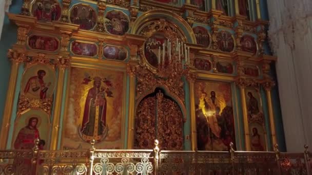 Altar with icons inside Resurrection Cathedral Istra New Jerusalem Monastery church interior details golden stucco rich golden decoration around paintings with saints. Faith religion culture Russia — Stock Footage Altar Icons Resurrection Cathedral Istra New Jerusalem Monastery Church Interior Royalty Free Stock Video