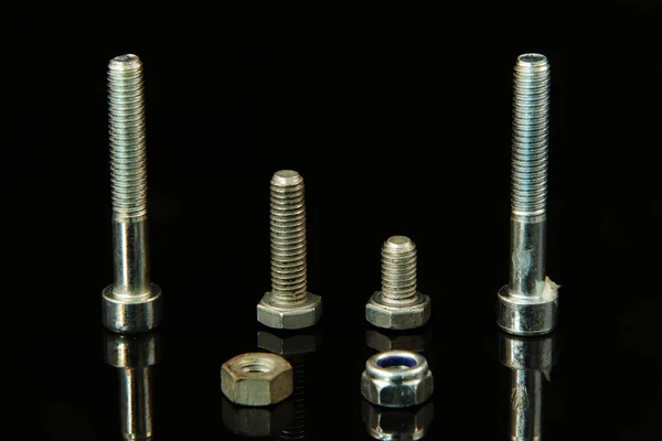 Many Silver Screws Curious Arrangement Black Background — Stock Photo, Image