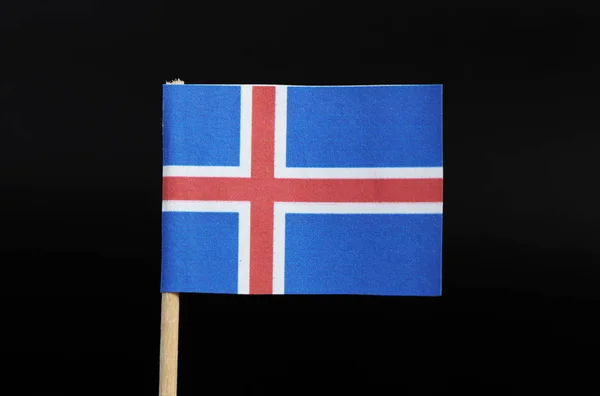 冰岛的官方旗帜在黑色背景的牙签上 一个蓝色的领域 白色边缘的红色北欧十字延伸到边缘 — 图库照片