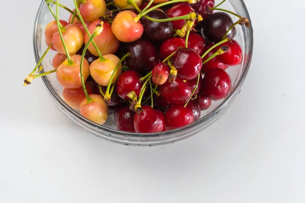 Cherries. Cherry. Cherries in color bowl and kitchen napkin. Red cherry. Fresh cherries. Cherry on white background. healthy food concept