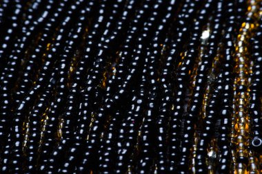 Siyah doku boncuk. Makro fotoğraf. yukarıdan görüntülemek