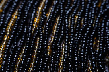 Siyah doku boncuk. Makro fotoğraf. yukarıdan görüntülemek