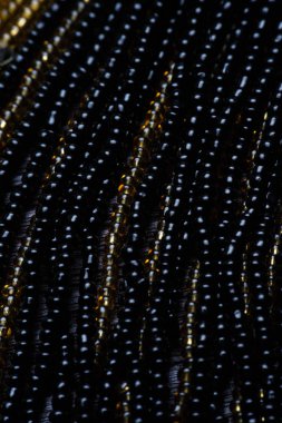 Siyah doku boncuk. Makro fotoğraf. yukarıdan görüntülemek