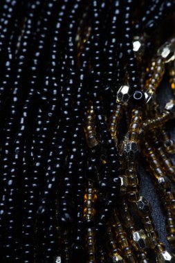 Siyah doku boncuk. Makro fotoğraf. yukarıdan görüntülemek