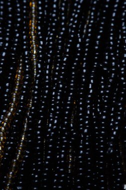 Siyah doku boncuk. Makro fotoğraf. yukarıdan görüntülemek