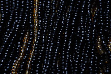 Siyah doku boncuk. Makro fotoğraf.