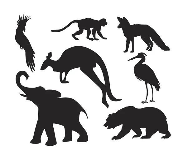 Conjunto de siluetas de animales africanos. Jirafa, elefante, antílope, hipopótamo, rinoceronte, camello, avestruz, cocodrilo, flamenco, cacatúa, babuino, gorila, león. Ilustración vectorial — Archivo Imágenes Vectoriales