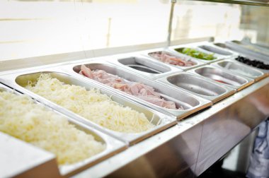 Food catering varieties background. Close up top side view, cooking using stainless steel dishware