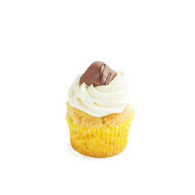 Cupcake hassas krem ve beyaz zemin üzerine şeker ile. Yemek, tatlılar, tatil kavramı.