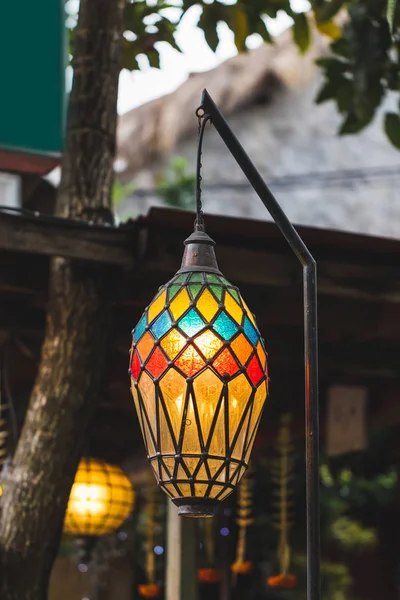 Old hanging lamp made from stained glass, moroccan style.