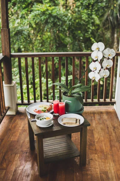 Breakfast Eggs Fresh Watermelon Juice Orchid Flower Wooden Terrace — Stock Photo, Image