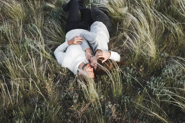 Happy Young Loving Couple Lying Feather Grass — Stock Photo, Image